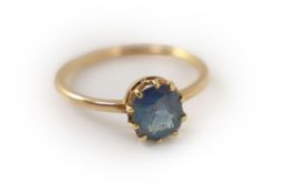 An early 20th century gold and oval cut Alexandrite set ring,the stone weighing approximately 1.