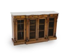 A Victorian rosewood serpentine dwarf bookcase,with serpentine marble top and four brass grilled