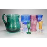 A mixed group of coloured glassware