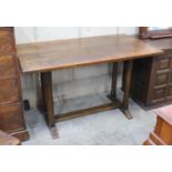 A small rectangular Arts and Crafts oak refectory table, length 121cm, depth 69cm, height 73cm
