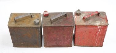 Three various petrol cans