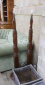 A pair of carved mahogany lamp standards, height 137cm