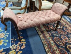 An Edwardian mahogany window seat, with deep buttoned upholstered seat, length 114cm, depth 38cm,