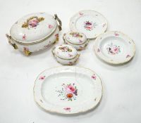 A 19th century floral painted part dinner service