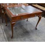 A reproduction George III style mahogany two drawer writing table, width 110cm, depth 72cm, height