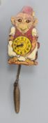 A Paico Wood and tin plate novelty monkey wall timepiece, 21cm