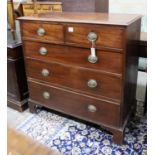 A George III mahogany straight front chest, fitted three long drawers and two short drawers, width