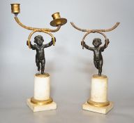 A pair of 19th century bronze and ormolu cherub candelabra, on alabaster plinths, 33cm