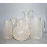 Five various Victorian iced glass jugs, 29cm