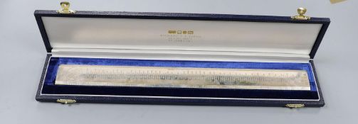 A cased modern silver 'Presidents Rule' ruler, engraved with the names and dates of US Presidents,