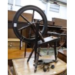 A reproduction spinning wheel, height 90cm