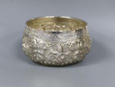 An Indian embossed white metal bowl, diameter 11.2cm, 4.5oz.