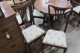 A set of eight early 20th century mahogany dining chairs, two with arms