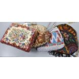 A fine needlework petit point evening bag, a 19th century bible bag, an early 20th century beaded