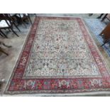 A Tabriz ivory ground pictorial rug (signed), 390 x 294cm