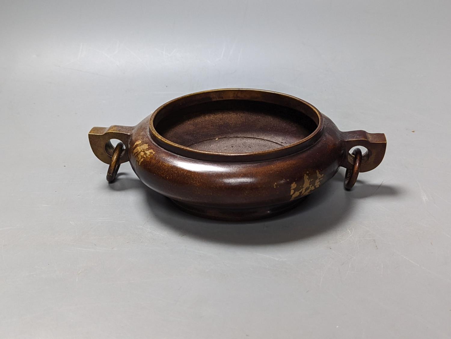 A Chinese gold splashed bronze censer, 15cm diam.