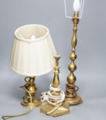Three brass lamps
