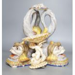 An 18th century Venetian maiolica ‘dolphin’ base and associated blush ivory cherubic figural bowl,