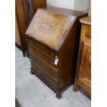 An Edwardian marquetry inlaid mahogany bureau, width 61cm, depth 46cm, height 99cm