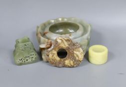 A Chinese jade brushwasher and three hardstone carvings