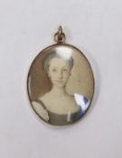 A 19th century portrait miniature, young lady, mounted as a pendant, 4.5x3.5cm