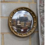A Regency style circular gilt framed convex wall mirror, diameter 45cm