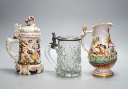 An Italian porcelain lidded tankard and matching jug, together with a cut glass lidded tankard