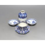A Japanese blue and white vase, two similar dishes and a tea bowl and saucer