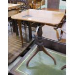 A Victorian rectangular mahogany tilt top wine table, on an inverted triple splay leg base, width