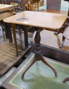 A Victorian rectangular mahogany tilt top wine table, on an inverted triple splay leg base, width