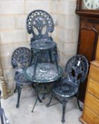 A Victorian style aluminium circular garden table, diameter 60cm, height 62cm and four chairs