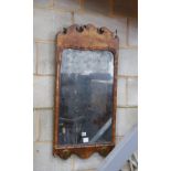 An 18th century walnut fret cut wall mirror, width 48cm, height 96cm