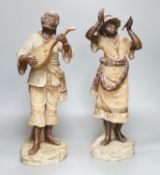 A pair of terracotta musician figures, incised numbers to base, 49cm