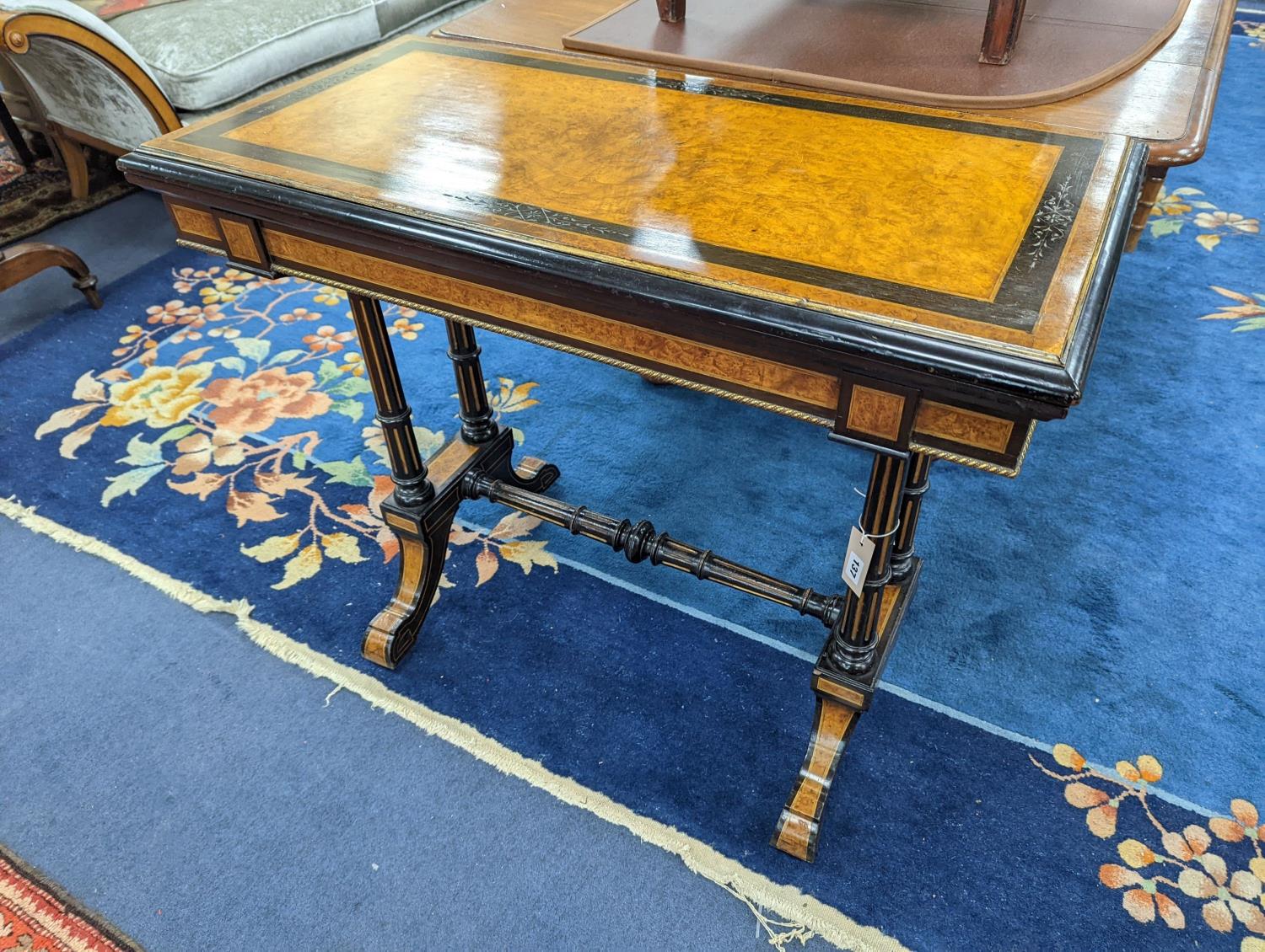 A Victorian part ebonised rectangular Amboyna folding card table, width 91cm, depth 46cm, height