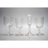 A mid 18th century trumpet bowled wine glass and three other glasses, 18cm