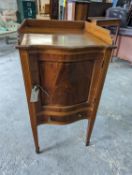 An Edwardian inlaid mahogany serpentine bedside cabinet, width 43cm, depth 43cm, height 84cm