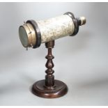 A Victorian kaleidoscope, on original turned wood stand, 39cm