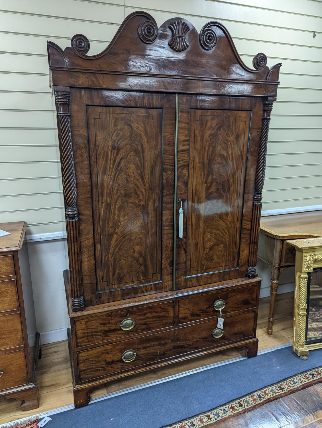 A William IV mahogany hanging cupboard, converted from a linen press, width 120cm, depth 57cm,