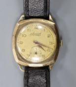 A gentleman's 1950's 9ct gold Accurist manual wind wrist watch, on associated leather strap, gross
