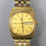 A gentleman's steel and gold plated Omega Seamaster automatic day/date wrist watch, on associated