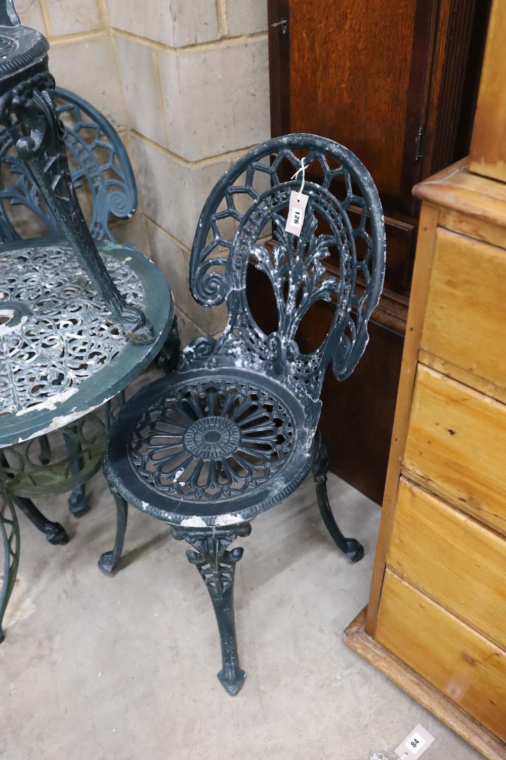 A Victorian style aluminium circular garden table, diameter 60cm, height 62cm and four chairs - Image 2 of 3
