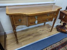 An early 20th century Sheraton style satinwood banded and marquetry inlaid mahogany breakfront