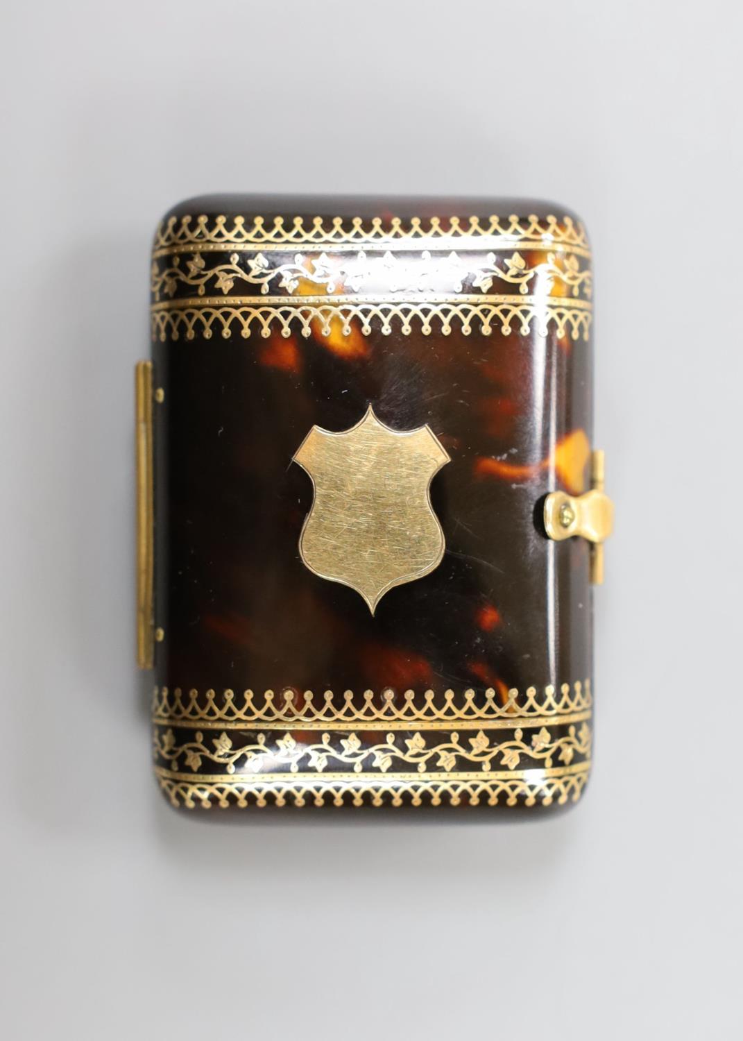 A Victorian gold-mounted tortoiseshell purse, circa 1900, 7cm