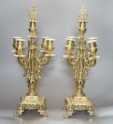 A pair of gilt brass candelabra, 49cm