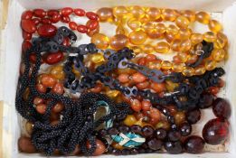 Mixed costume jewellery, including faux amber necklaces and paste set spider and serpent brooches,