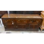 An 18th century oak dresser base, length 189cm, depth 53cm, height 79cm