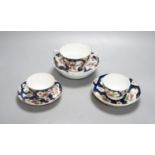 A Worcester scale blue chocolate cup and saucer and a pair of similar tea bowls and saucers, circa