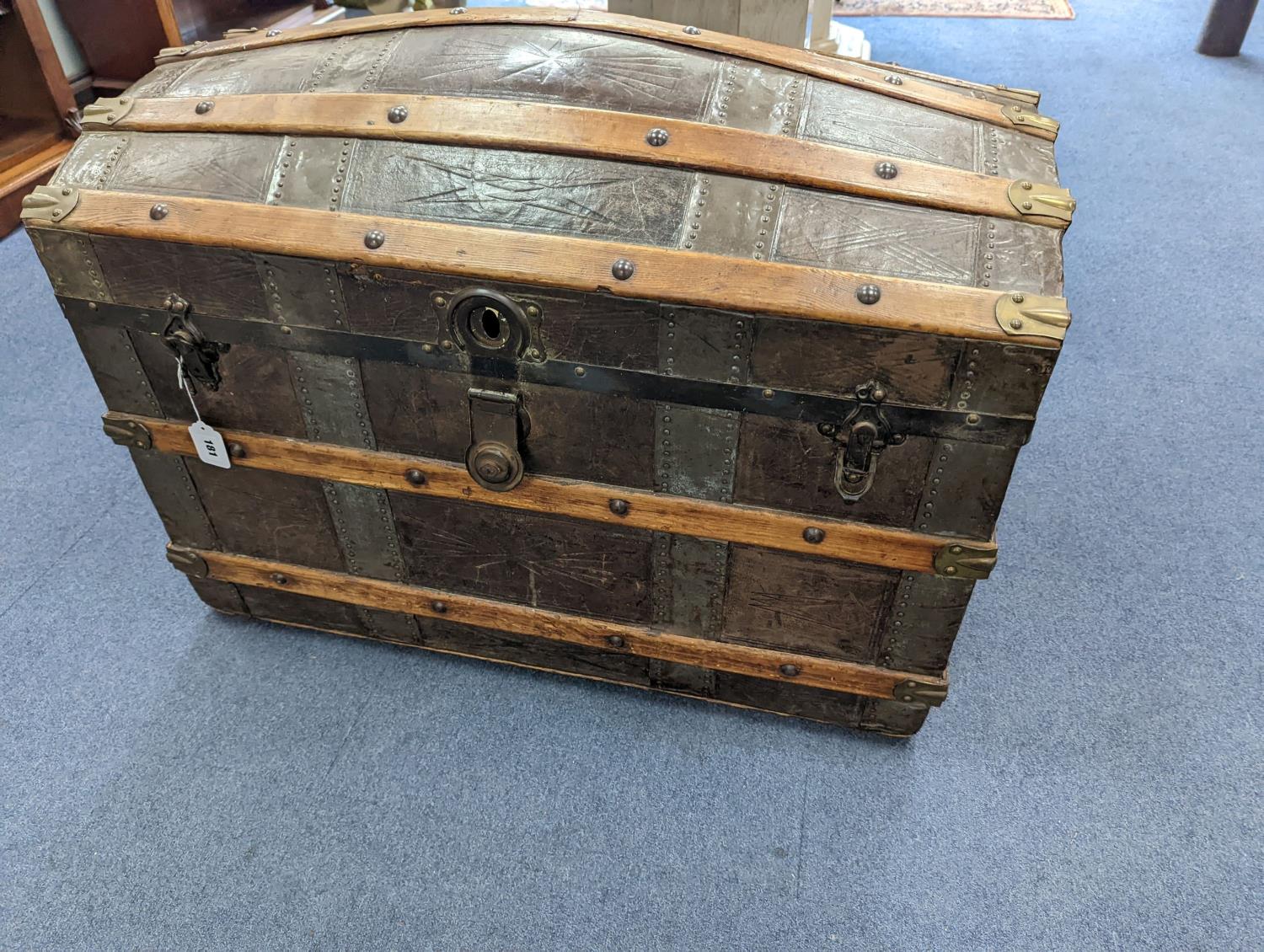 A Victorian leather bound dome top trunk, length 88cm, depth 50cm, height 60cm