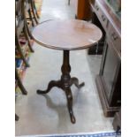 A George III mahogany circular tilt top tripod table, diameter 50cm, height 70cm