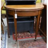 A George III mahogany D-shaped folding tea table, width 39cm, depth 80cm, height 73cm